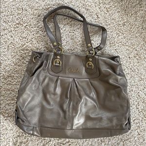 GUC Metallic Coach Purse with gold accents